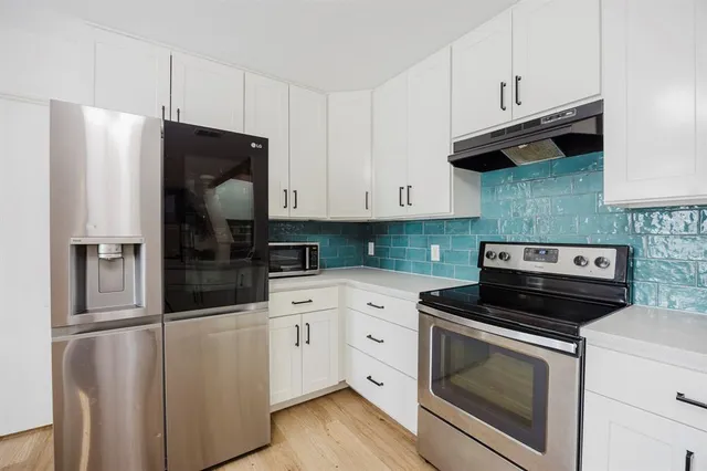 a view of living room with granite countertop furniture