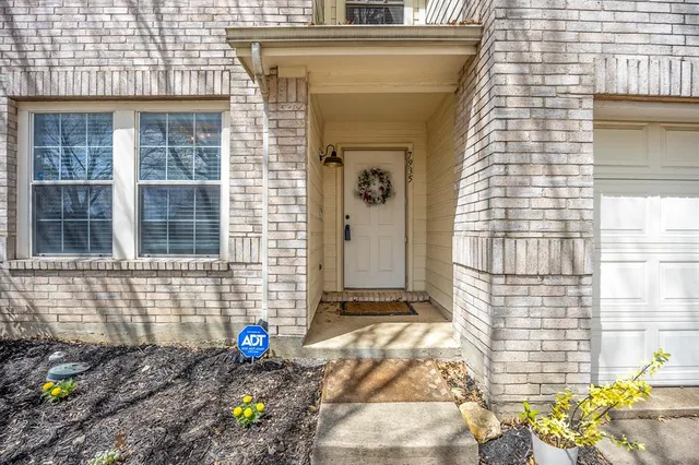 a view of a yard with a tree in the house