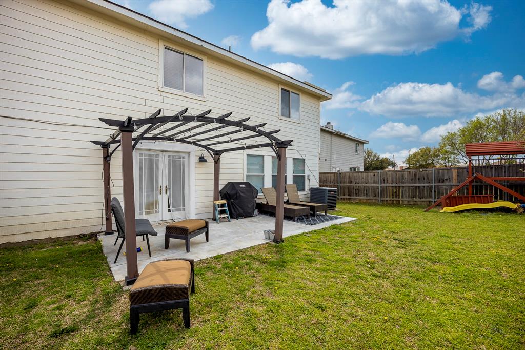 7935 Faithful Trail Dallas, TX 75237 - Photo 32 of 38 a view of a house with backyard and sitting area