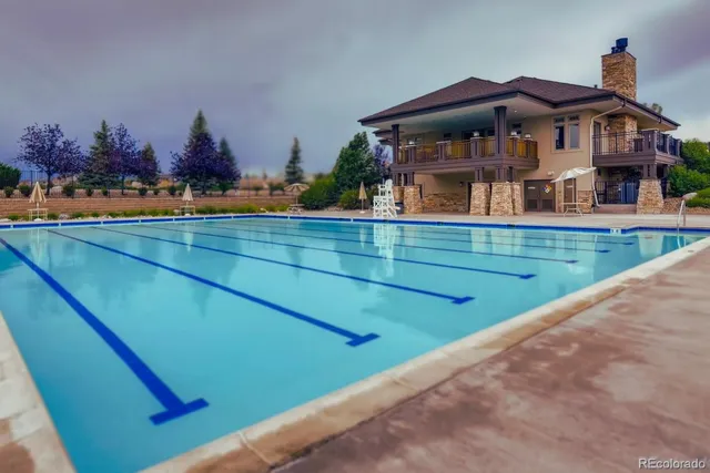 a view of a house with a swimming pool