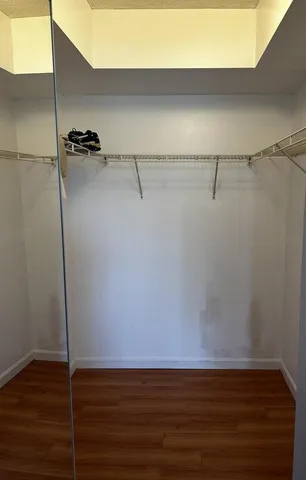 a view of a room with racks on the wall