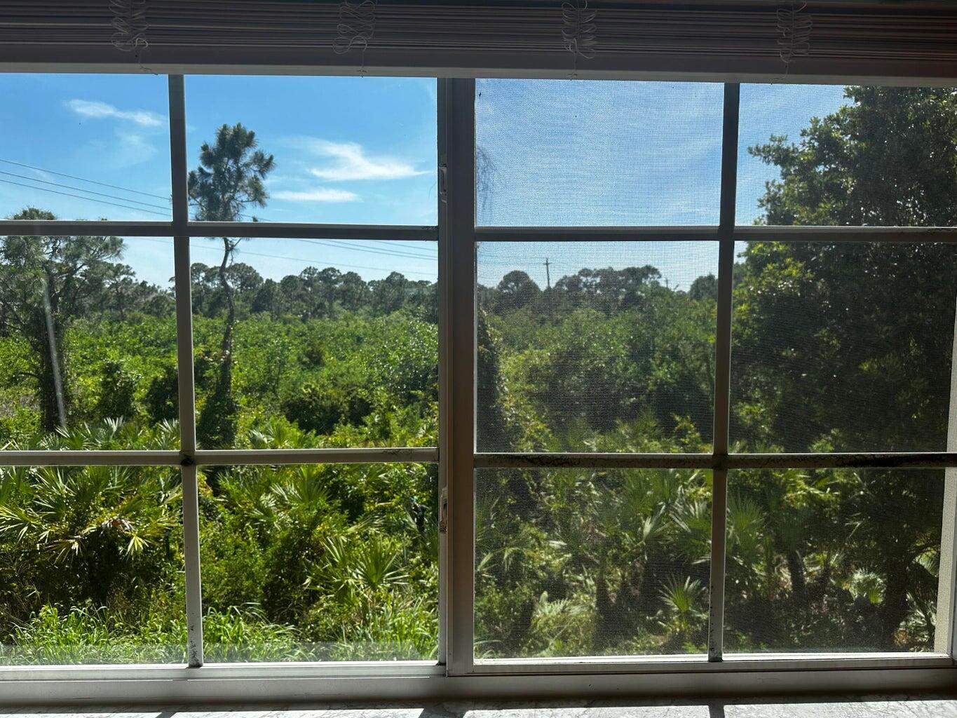 3615 Northwest Adriatic Lane, Unit 204 Jensen Beach, FL 34957 - Photo 20 of 40 a view of outdoor with green space