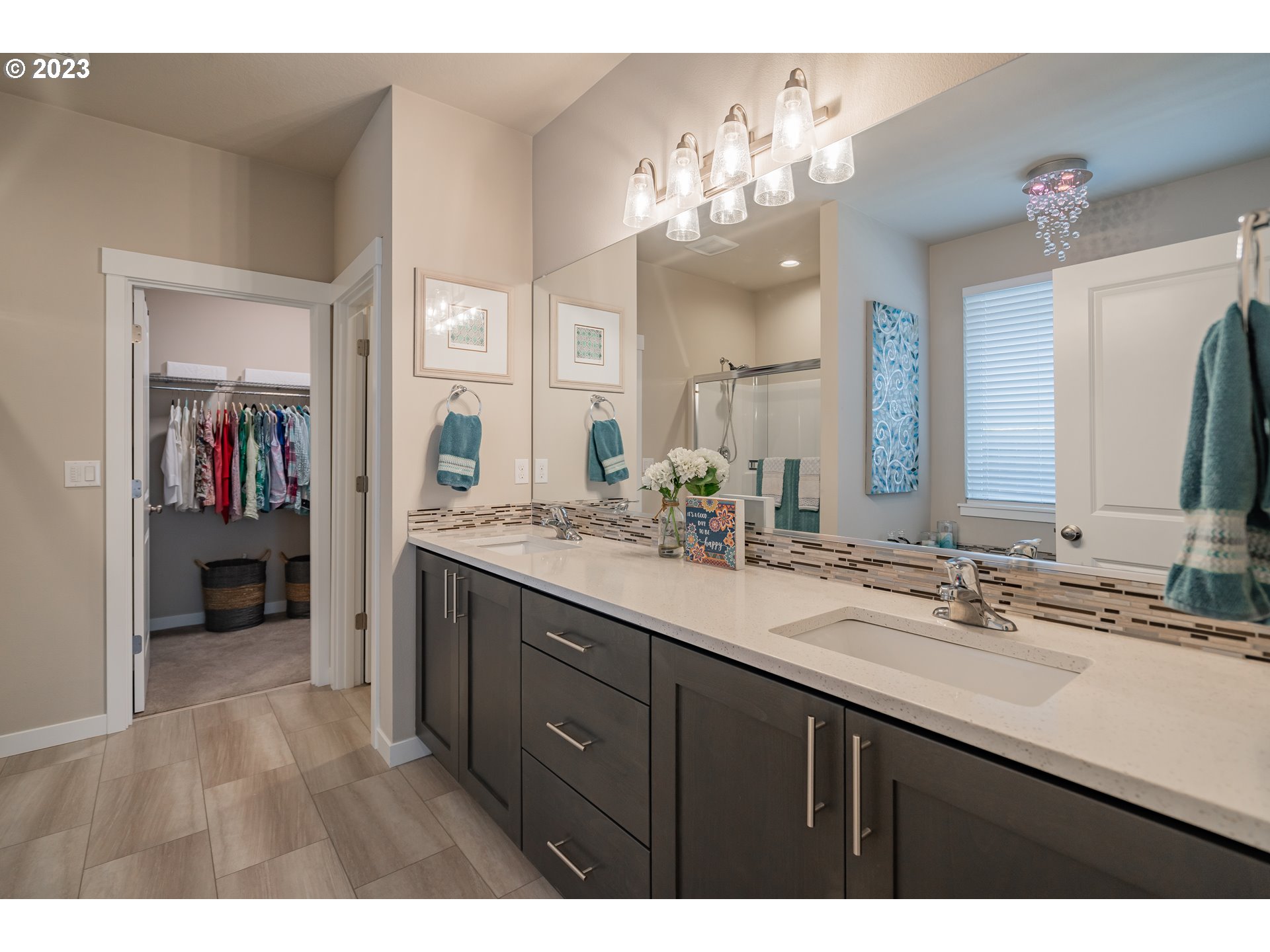 8518 North 1st Street Ridgefield, WA 98642 - Photo 17 of 41 a bathroom with a double vanity sink and a mirror