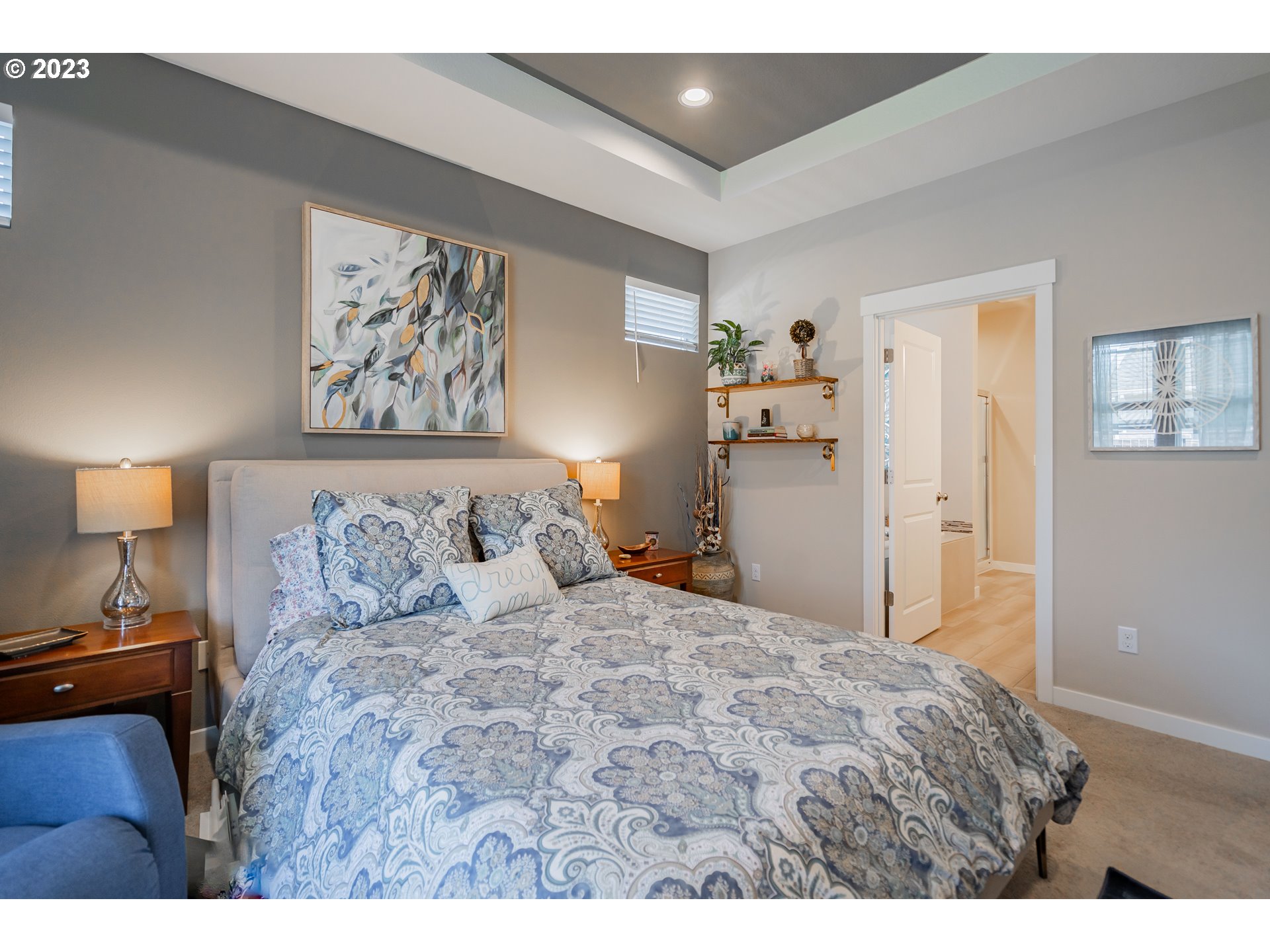 8518 North 1st Street Ridgefield, WA 98642 - Photo 19 of 41 a bedroom with a bed and a night stand