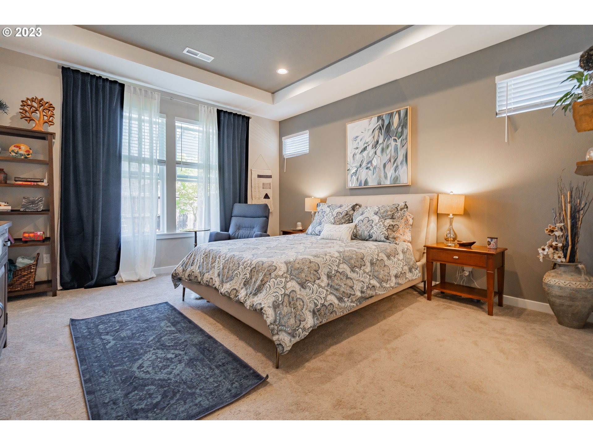 8518 North 1st Street Ridgefield, WA 98642 - Photo 20 of 41 a bedroom with a bed wooden floor and window