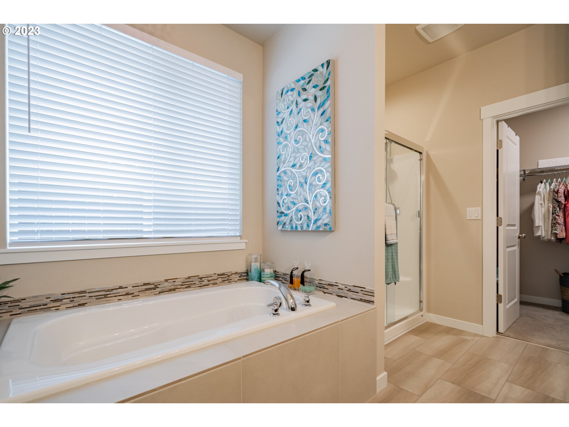 8518 North 1st Street Ridgefield, WA 98642 - Photo 23 of 41 a bathroom with a bathtub and a shower