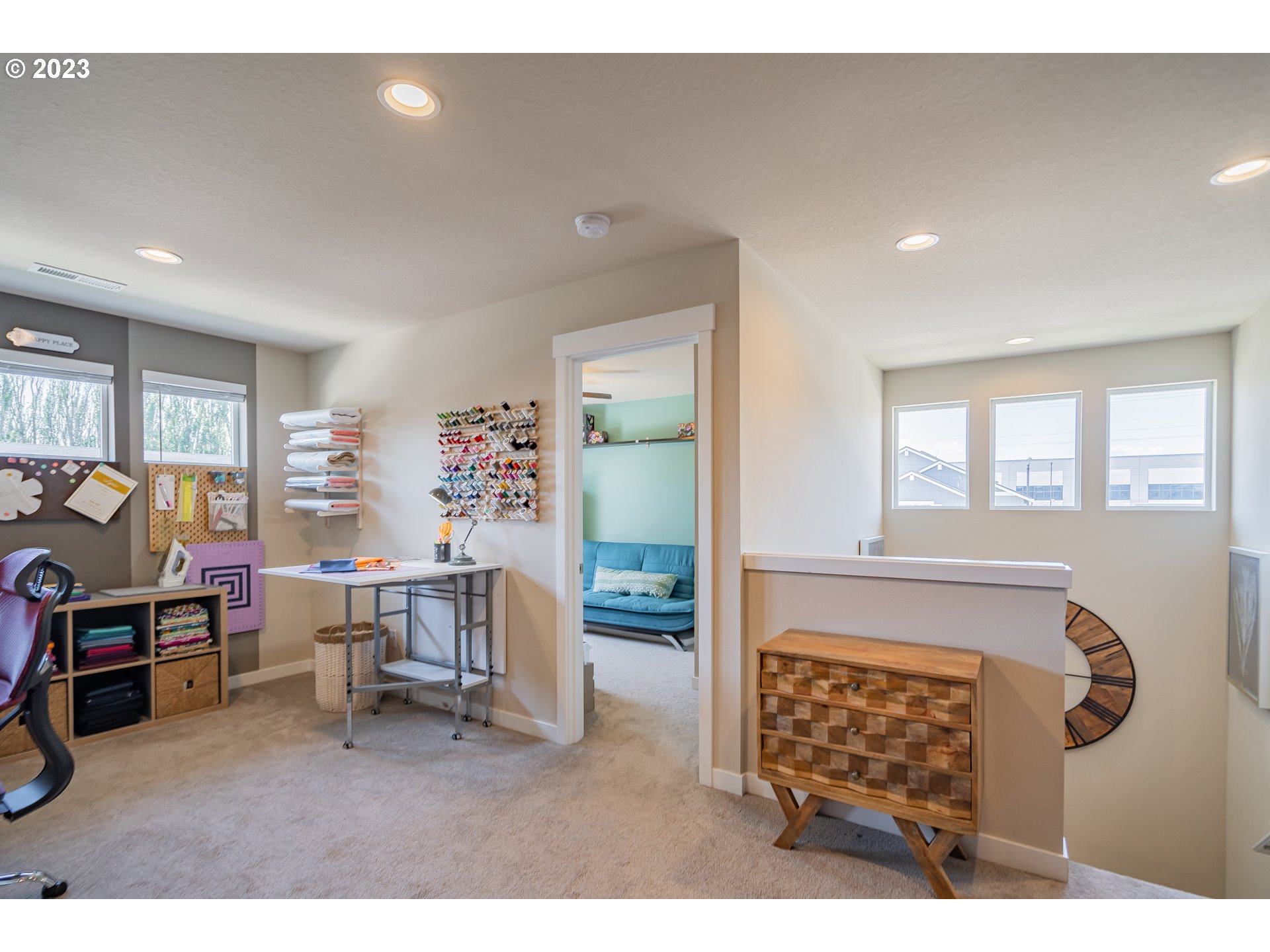 8518 North 1st Street Ridgefield, WA 98642 - Photo 26 of 41 a living room with furniture a air conditioner vent and a window