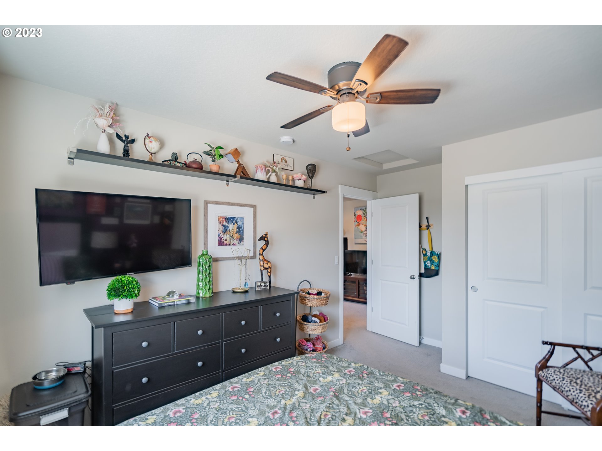 8518 North 1st Street Ridgefield, WA 98642 - Photo 27 of 41 a living room with furniture and a flat screen tv