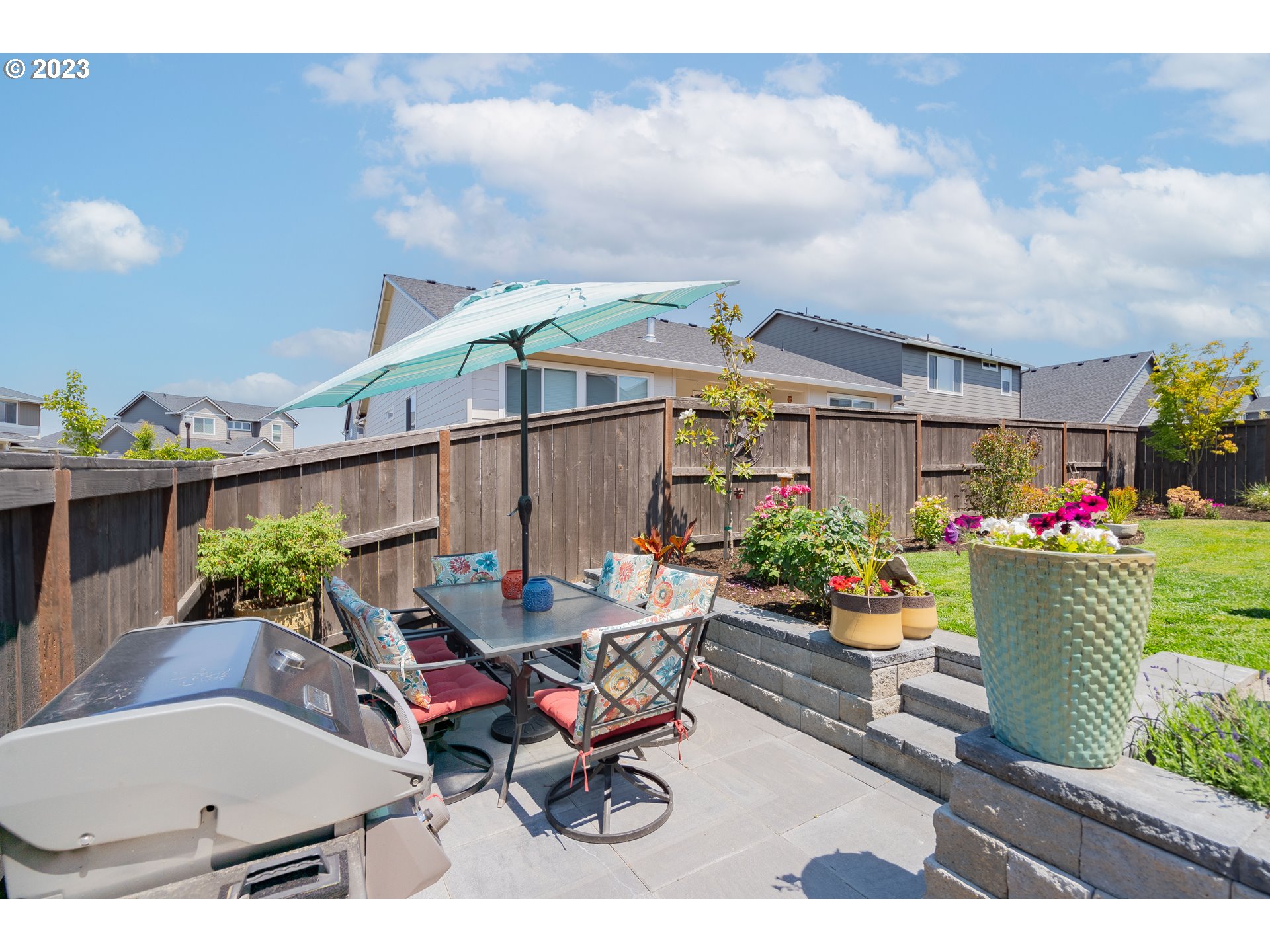 8518 North 1st Street Ridgefield, WA 98642 - Photo 37 of 41 a view of a table and chairs in patio