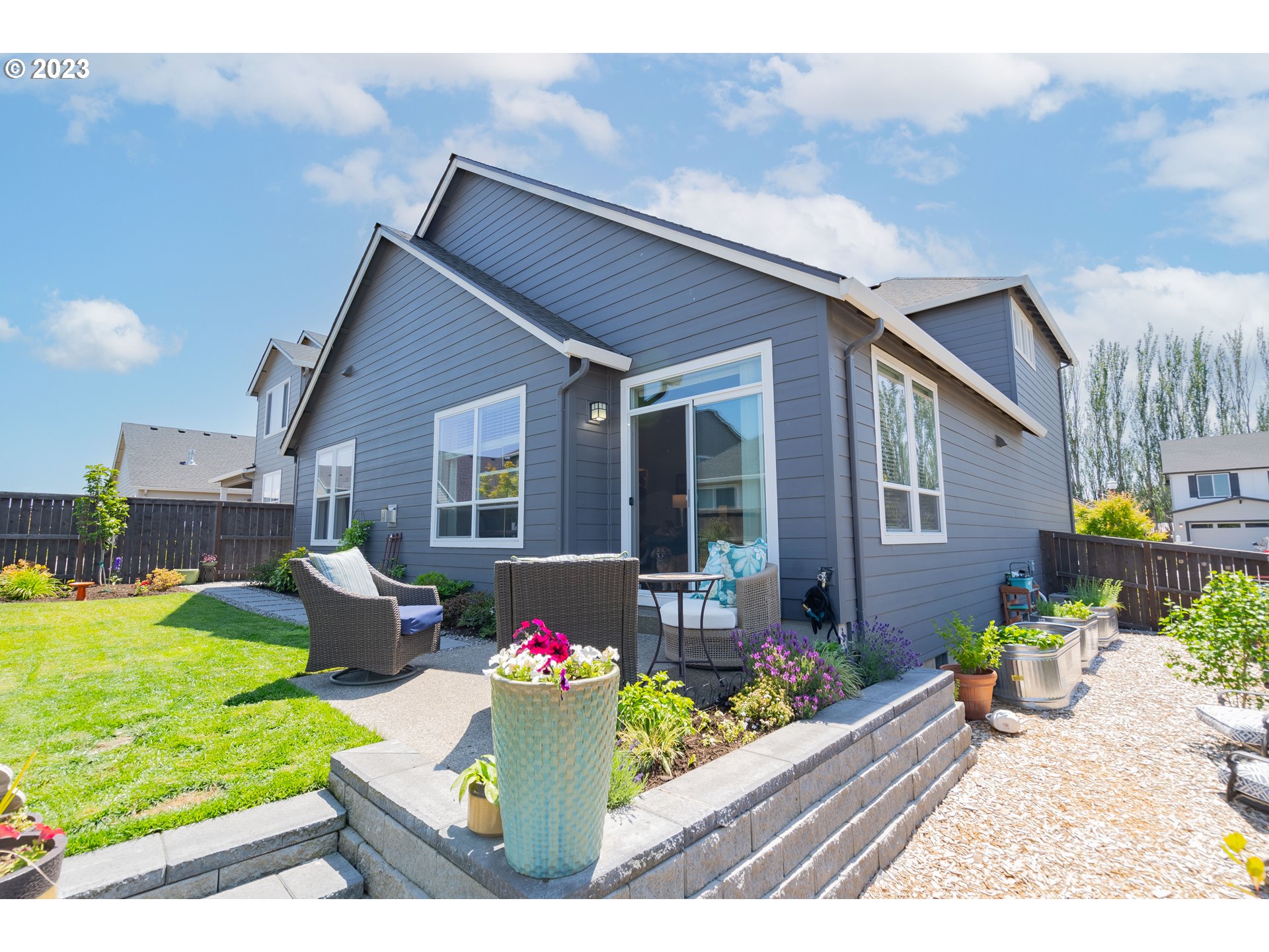 8518 North 1st Street Ridgefield, WA 98642 - Photo 39 of 41 a front view of a house with garden