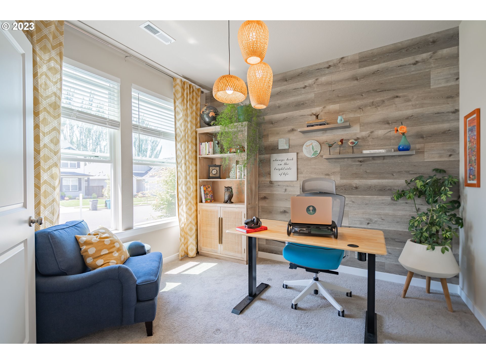 8518 North 1st Street Ridgefield, WA 98642 - Photo 4 of 41 a living room with furniture and a large window