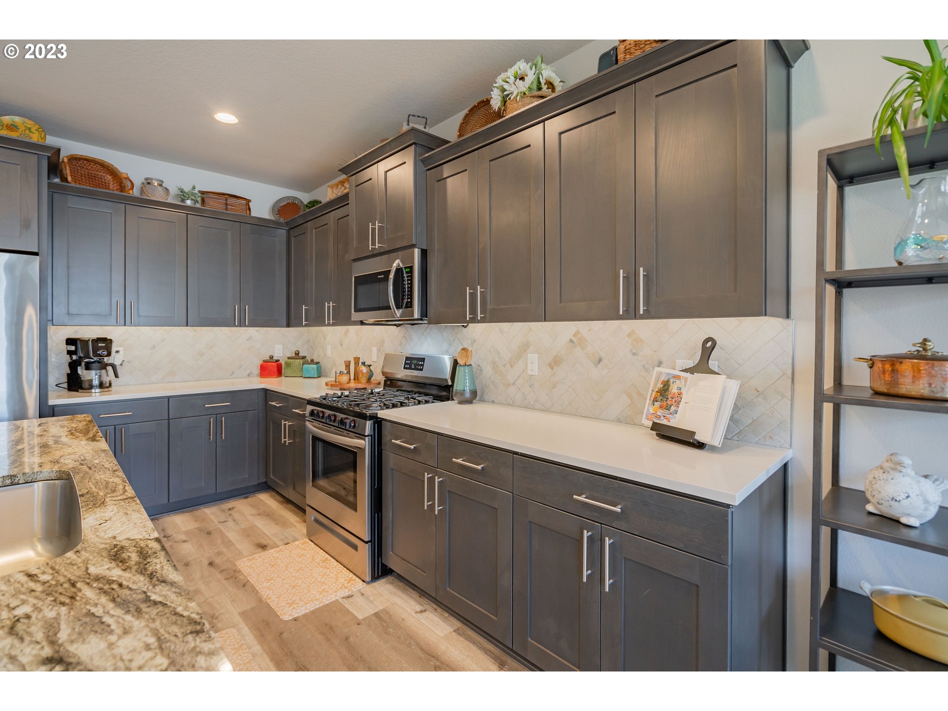8518 North 1st Street Ridgefield, WA 98642 - Photo 8 of 41 a kitchen with a sink cabinets and appliances