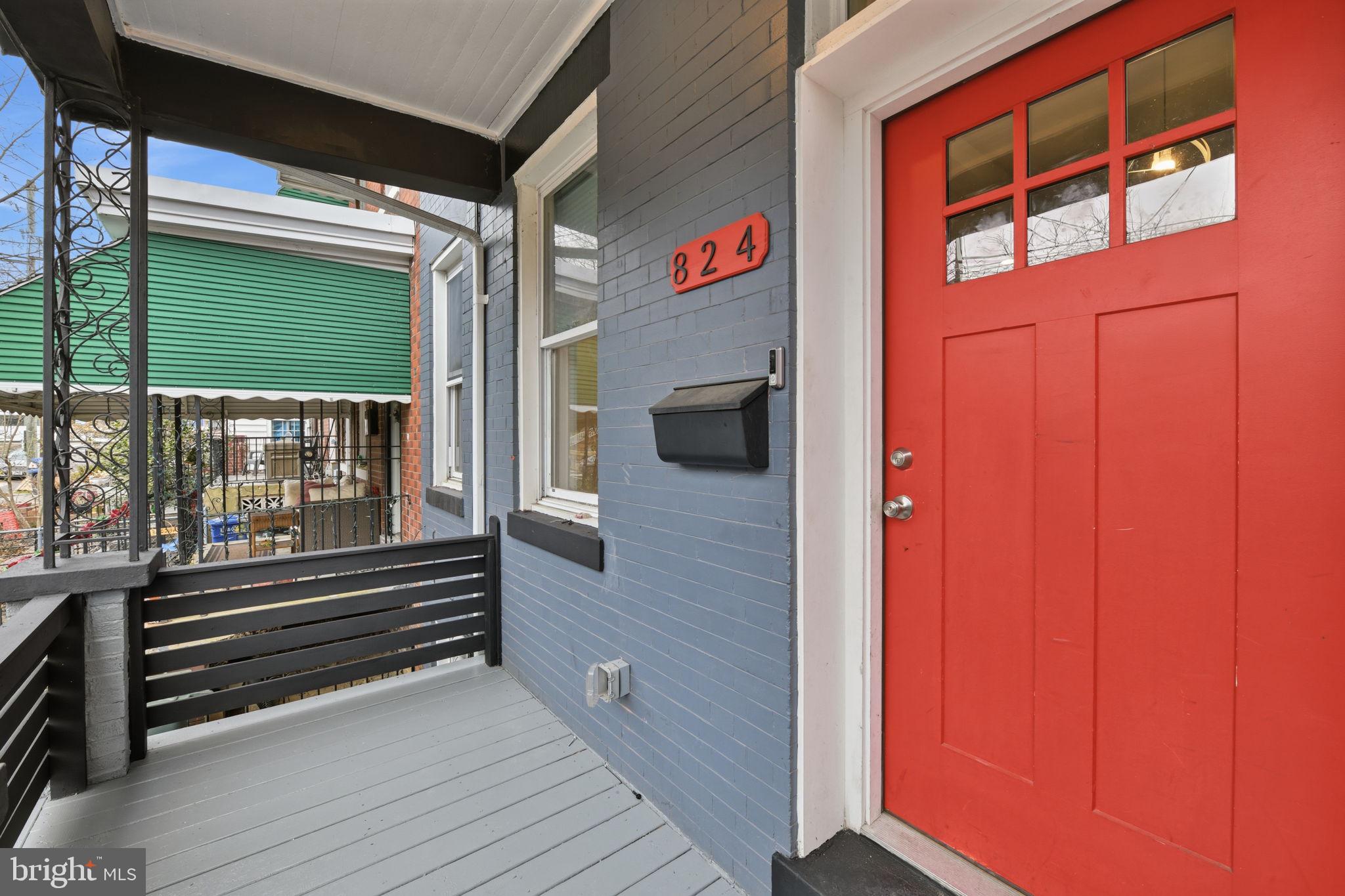 824 Allison Street Northwest Washington, DC 20011 - Photo 13 of 26 a view of entryway and hall with wooden floor