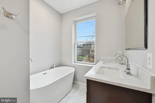 a bathroom with a sink and a bathtub