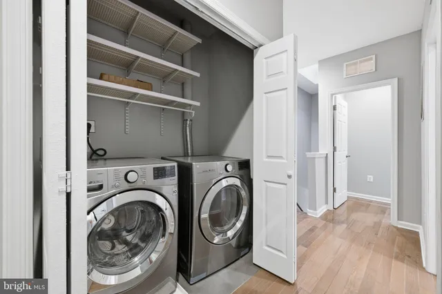 a utility room with dryer and washer