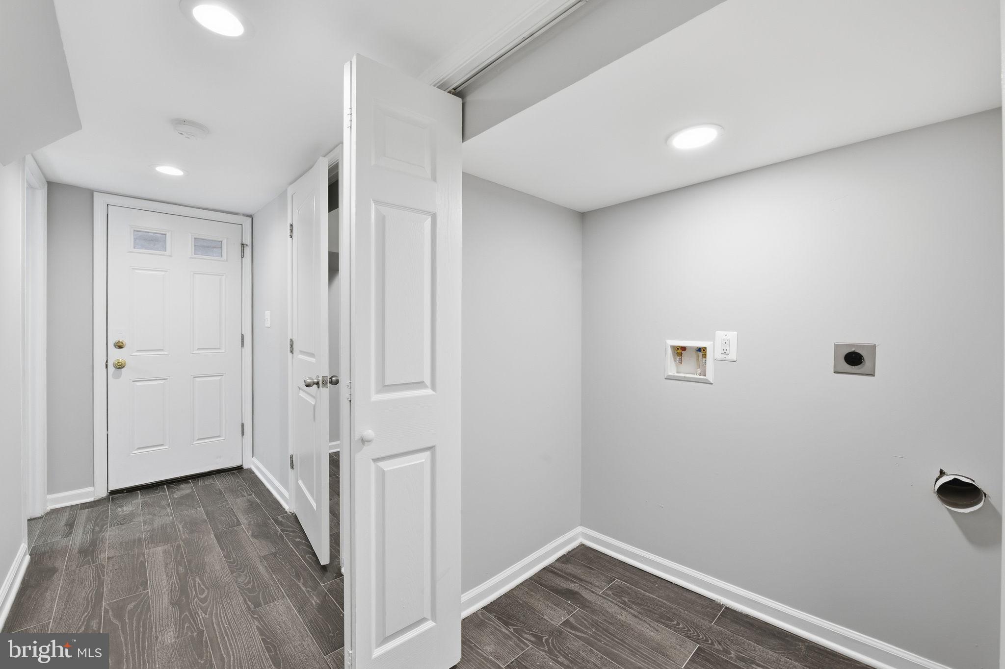 824 Allison Street Northwest Washington, DC 20011 - Photo 21 of 26 a view of a hallway with wooden floor