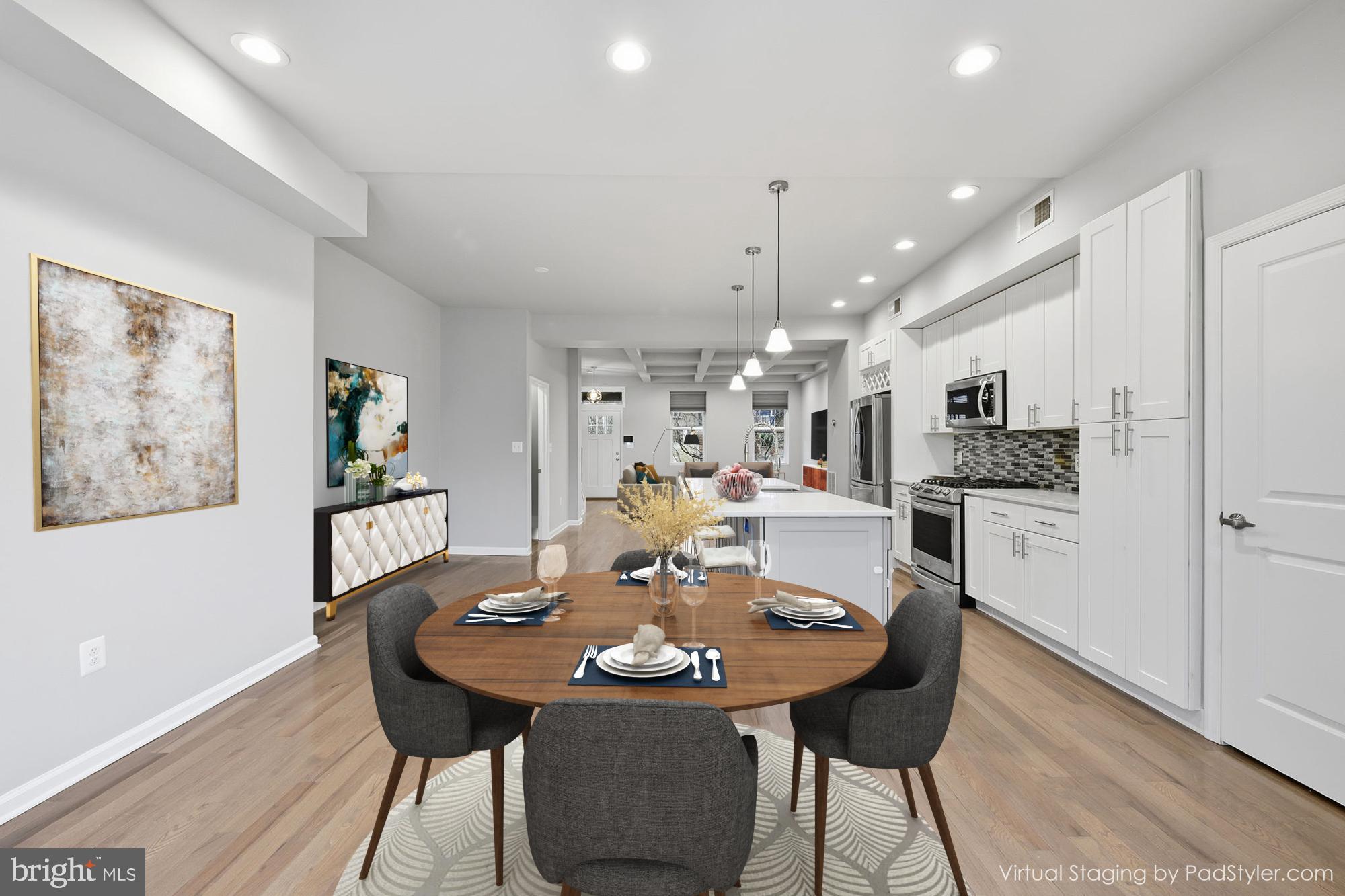 824 Allison Street Northwest Washington, DC 20011 - Photo 4 of 26 a view of a dining room with furniture and wooden floor