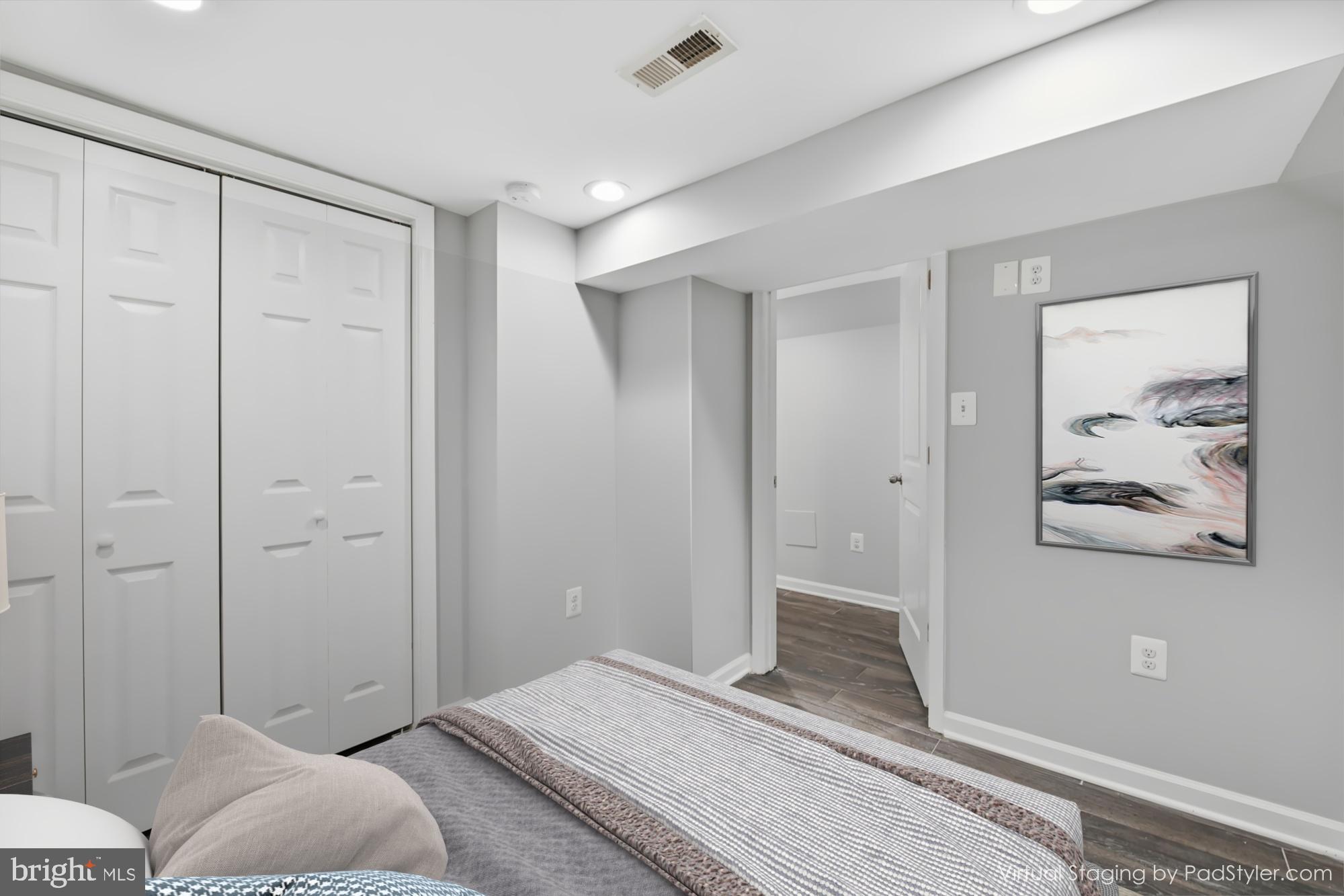 824 Allison Street Northwest Washington, DC 20011 - Photo 10 of 26 a bedroom with a bed and hallway