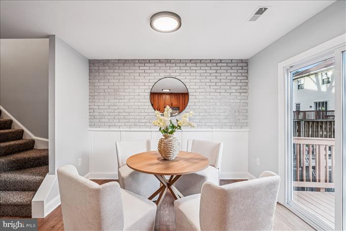 7646 South Arbory Lane, Unit 320 Laurel, MD 20707 - Photo 13 of 45 a dining room with furniture and window