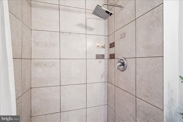 7646 South Arbory Lane, Unit 320 Laurel, MD 20707 - Photo 31 of 45 a bathroom with a shower