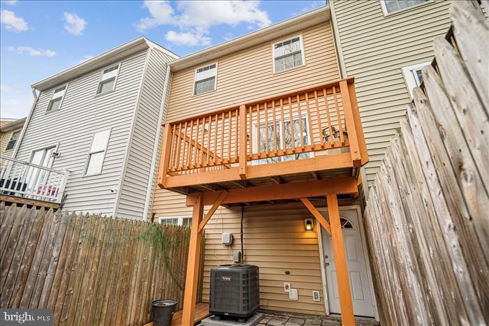 7646 South Arbory Lane, Unit 320 Laurel, MD 20707 - Photo 34 of 45 a view of a house with a balcony