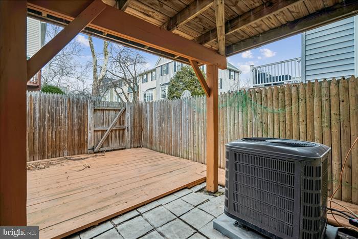 7646 South Arbory Lane, Unit 320 Laurel, MD 20707 - Photo 39 of 45 a bedroom with a bed and a dresser