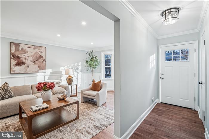 7646 South Arbory Lane, Unit 320 Laurel, MD 20707 - Photo 4 of 45 a living room with furniture and a window