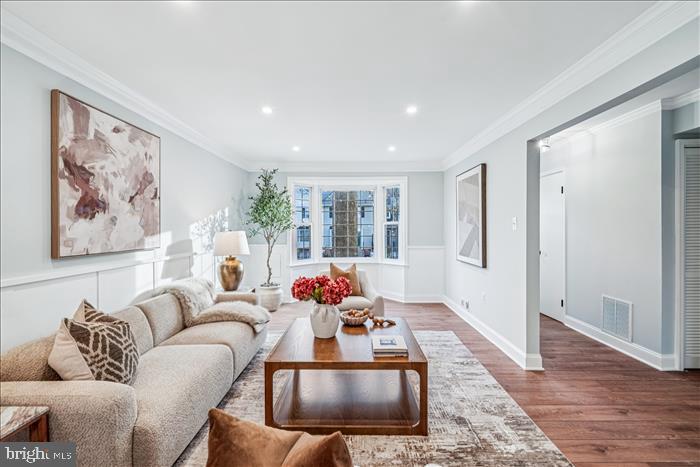 7646 South Arbory Lane, Unit 320 Laurel, MD 20707 - Photo 8 of 45 a living room with furniture and a large window