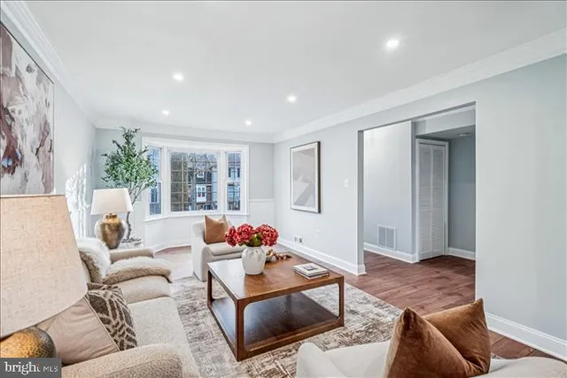 a living room with furniture and window