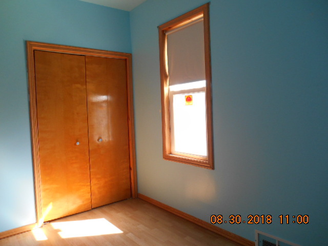 109 West Cleveland Street Spring Valley, IL 61362 - Photo 8 of 11 a view of an empty room and window