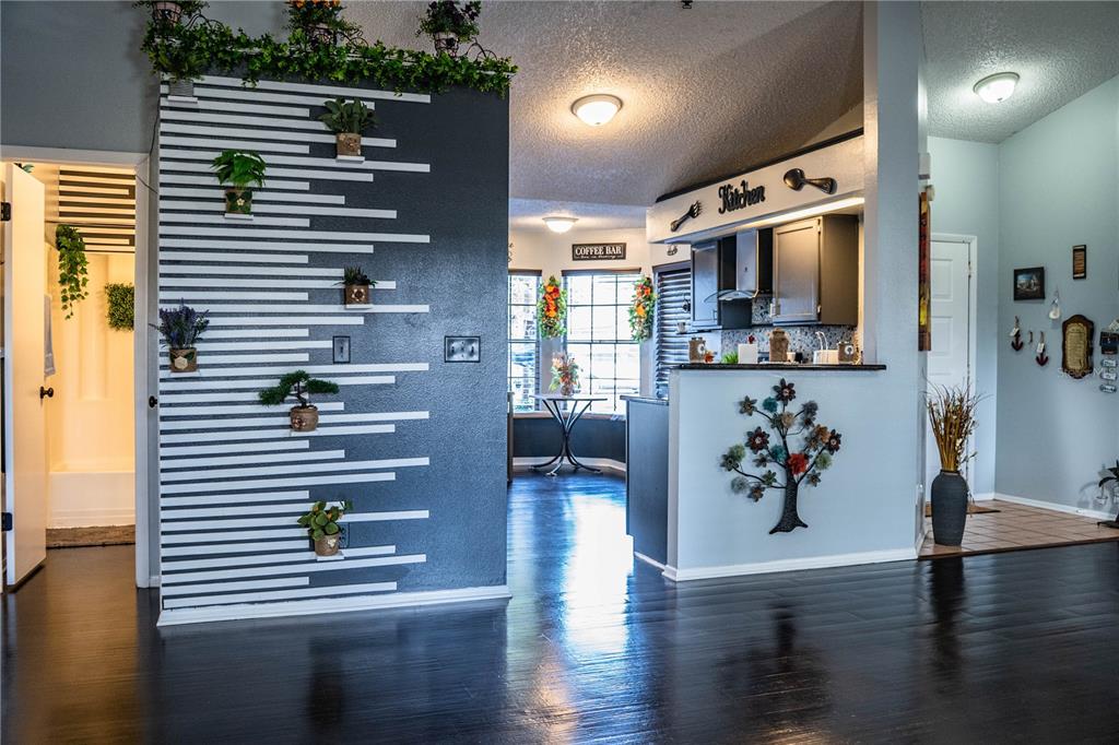 3304 Fox Ridge Drive Winter Haven, FL 33884 - Photo 16 of 60 a view of kitchen with furniture and flat screen tv