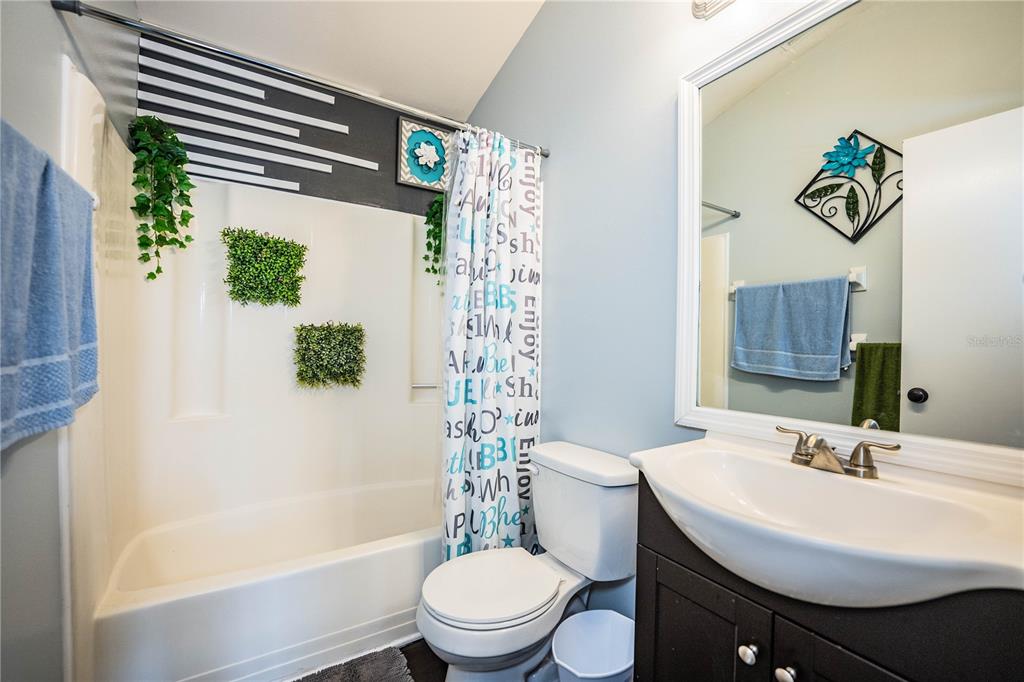 3304 Fox Ridge Drive Winter Haven, FL 33884 - Photo 36 of 60 a bathroom with a sink toilet and shower