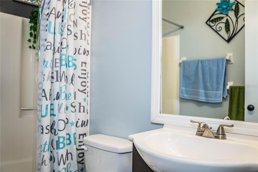 3304 Fox Ridge Drive Winter Haven, FL 33884 - Photo 38 of 60 a bathroom with a sink and a toilet