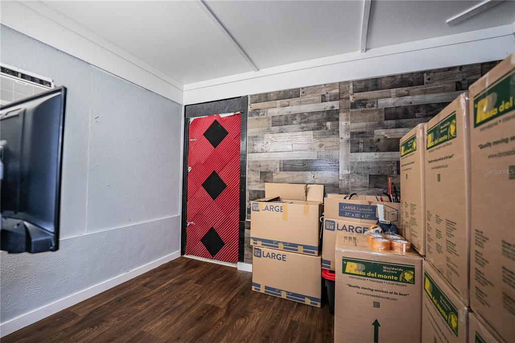 3304 Fox Ridge Drive Winter Haven, FL 33884 - Photo 40 of 60 a room with storage and utility