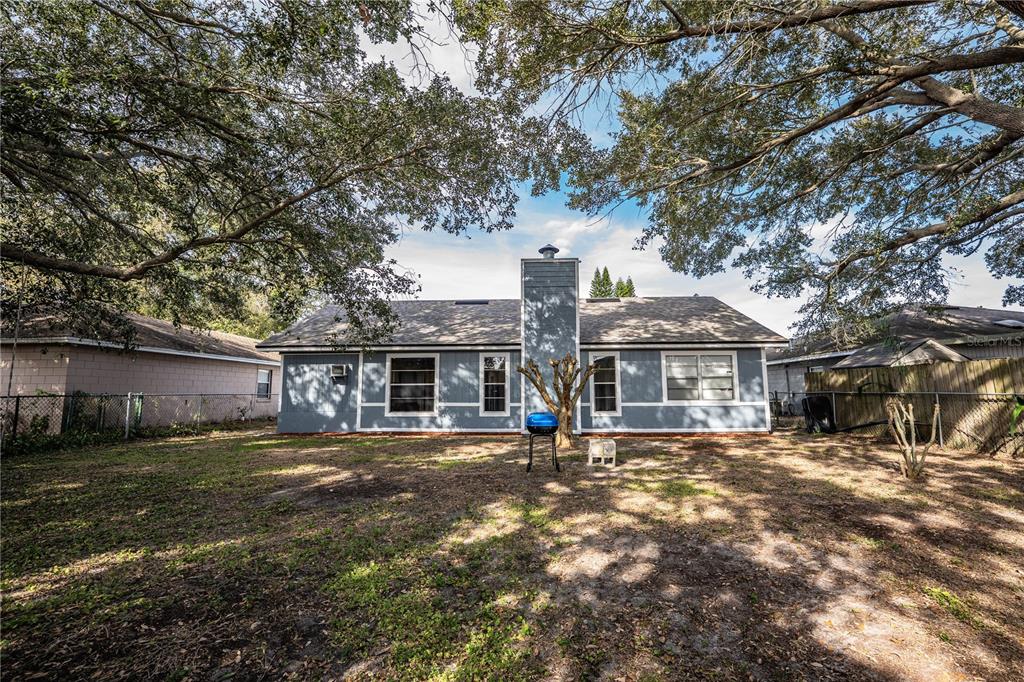 3304 Fox Ridge Drive Winter Haven, FL 33884 - Photo 42 of 60 front view of a house with a yard