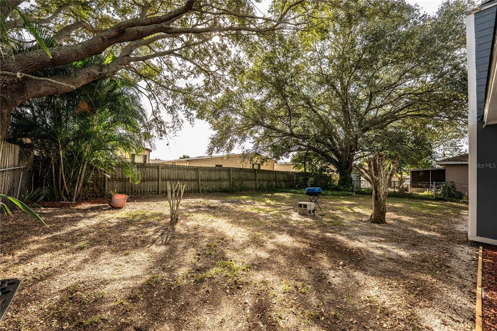 3304 Fox Ridge Drive Winter Haven, FL 33884 - Photo 49 of 60 a house with trees in front of it