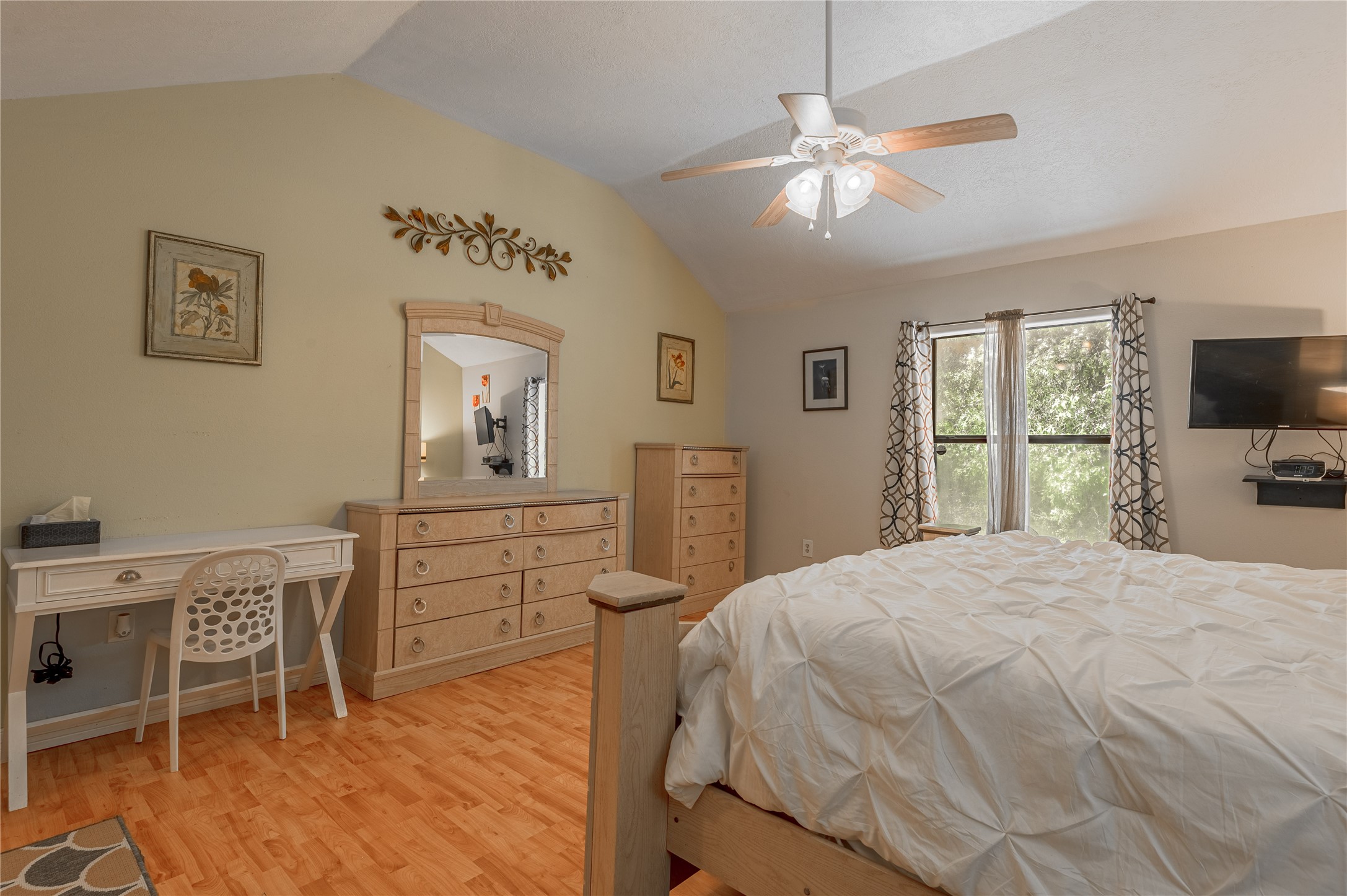47-57 Stage Coach Road Coldspring, TX 77331 - Photo 19 of 50 a bedroom with a bed and a flat screen tv