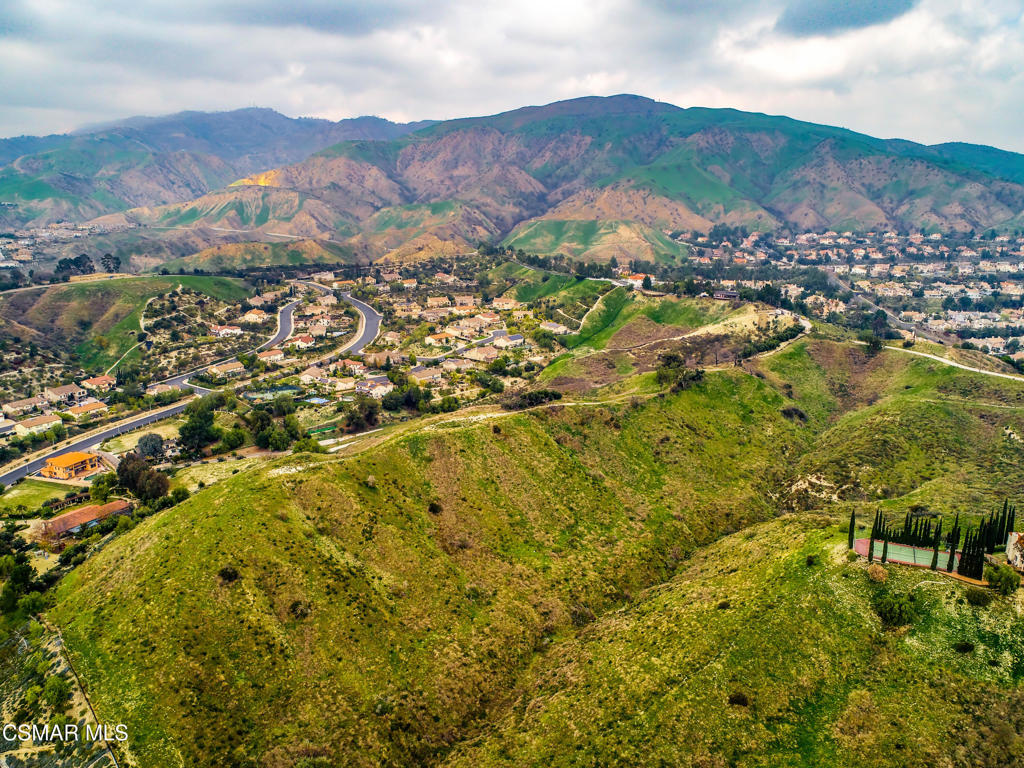 17900 Bull Canyon Road Granada Hills, CA 91344 - Photo 28 of 34 a view of a city with mountains in the background