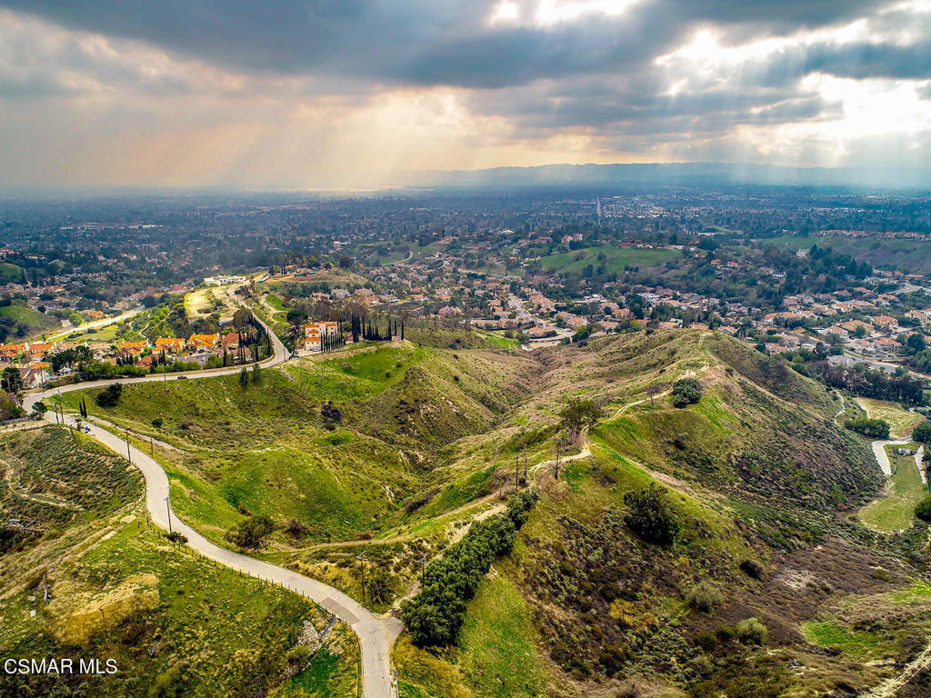17900 Bull Canyon Road Granada Hills, CA 91344 - Photo 8 of 34 an aerial view of residential houses with outdoor space