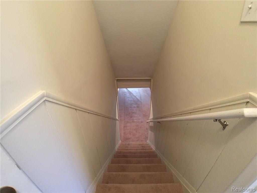 1160 Peavy Road Howell, MI 48843 - Photo 12 of 17 410 stairs to basement IMG_7369_DxOVP.jpg