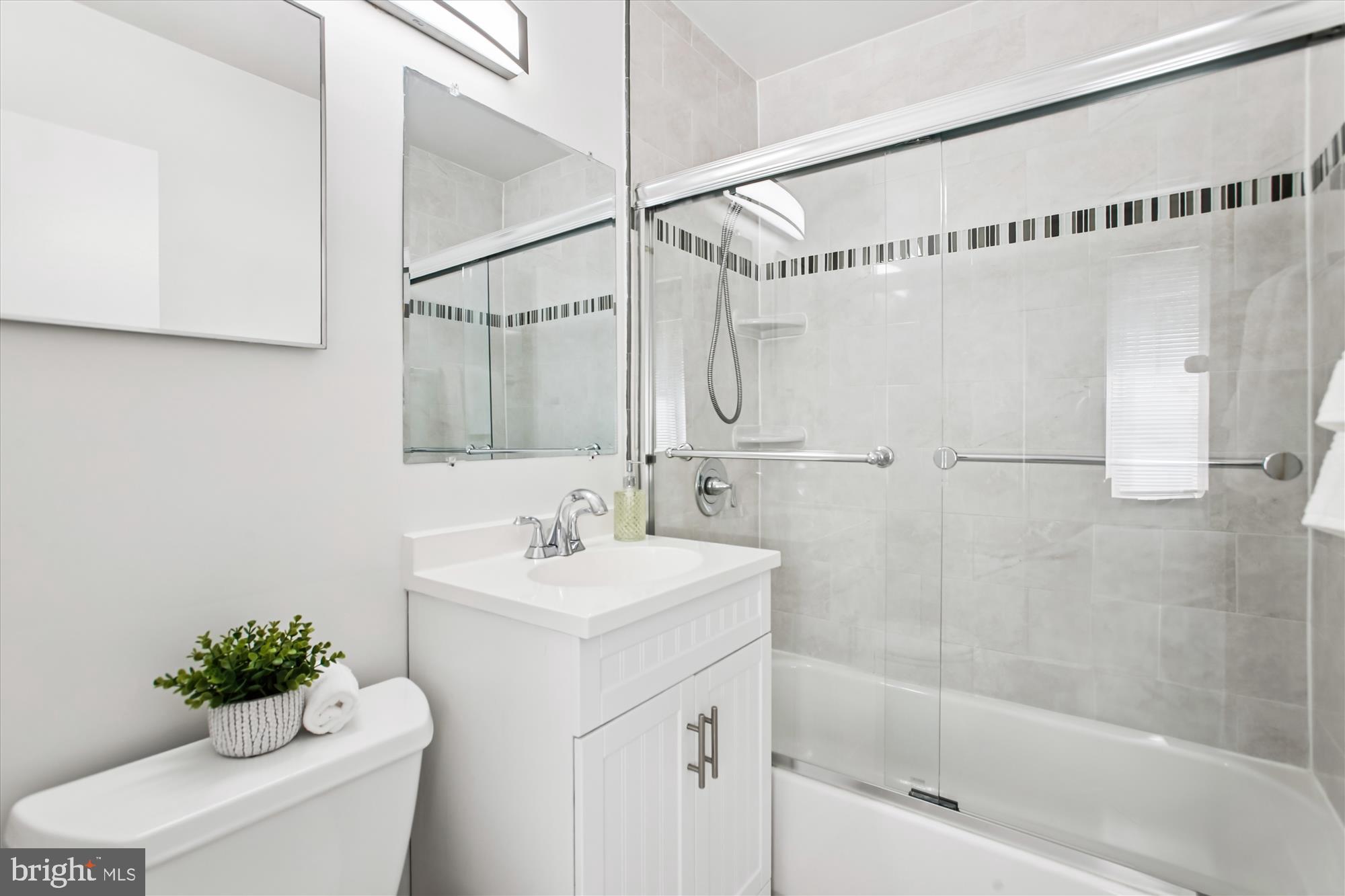 301 I Street Southwest, Unit 108 Washington, DC 20024 - Photo 19 of 55 a bathroom with a sink toilet and shower