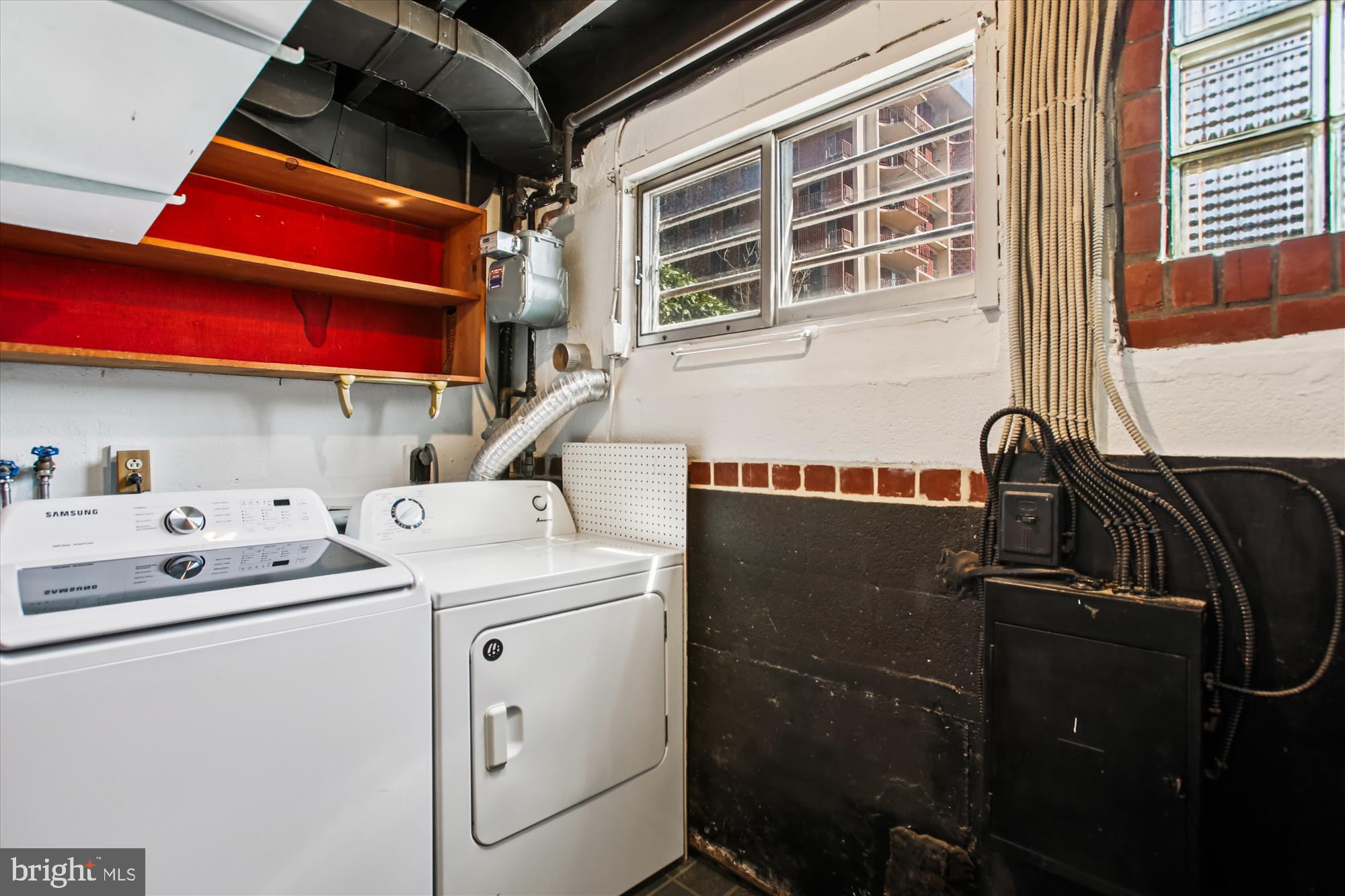301 I Street Southwest, Unit 108 Washington, DC 20024 - Photo 25 of 55 a utility room with dryer and washer