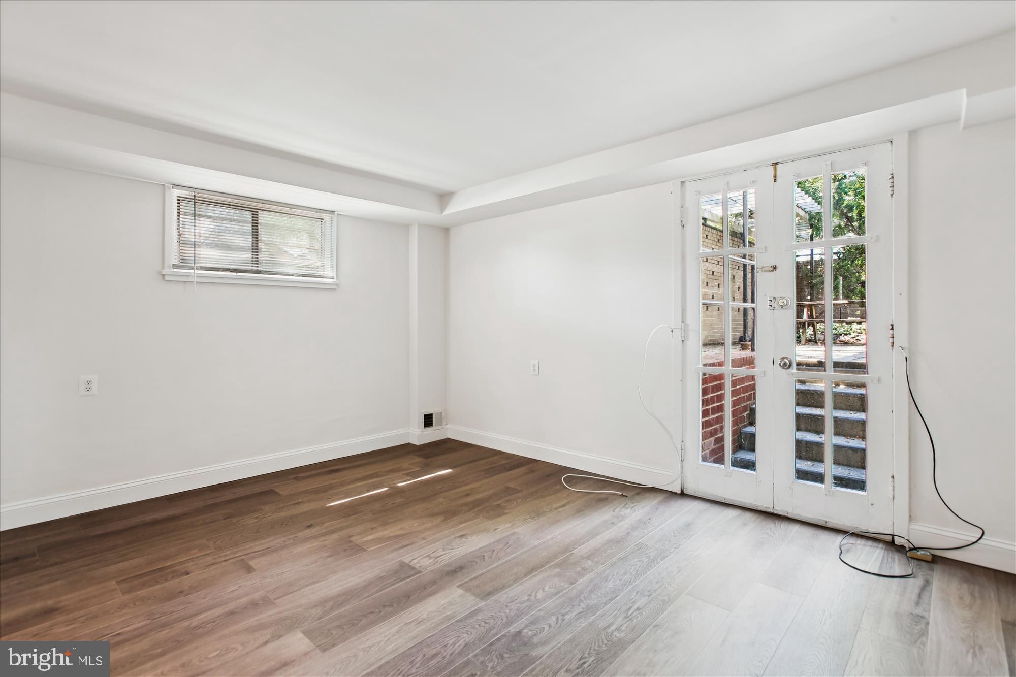 301 I Street Southwest, Unit 108 Washington, DC 20024 - Photo 31 of 55 a view of a livingroom with wooden floor