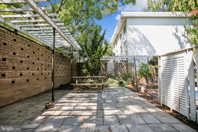 a view of a building with a yard