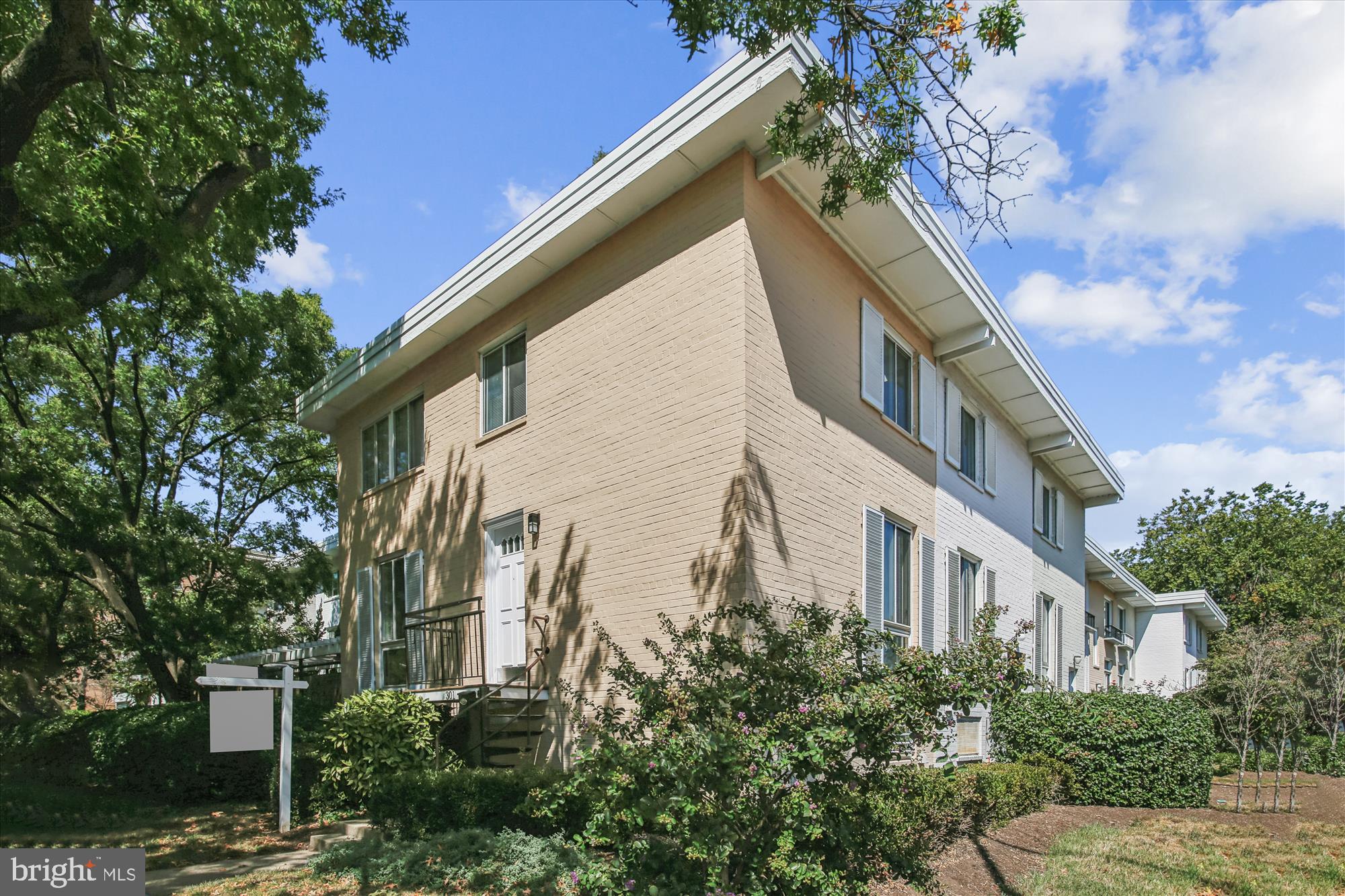 301 I Street Southwest, Unit 108 Washington, DC 20024 - Photo 36 of 55 a view of a building with a yard