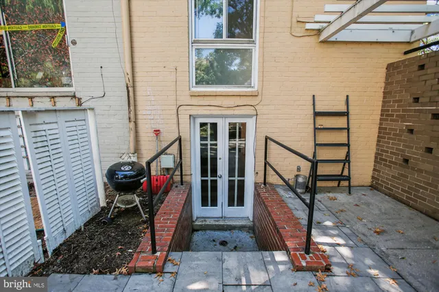 a view of a building with a tree