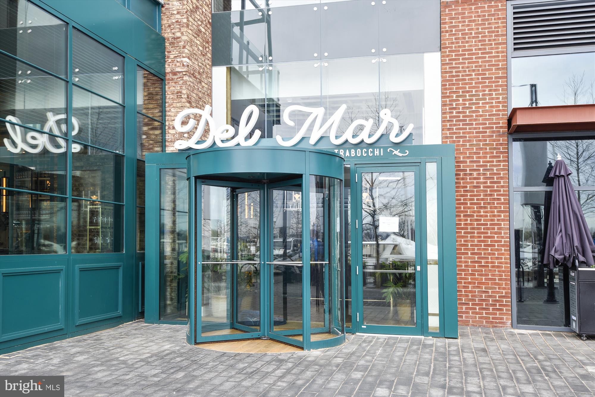 301 I Street Southwest, Unit 108 Washington, DC 20024 - Photo 52 of 55 a front view of a building with a glass door