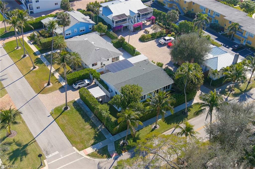 725 2nd Street South Naples, FL 34102 - Photo 19 of 21 an aerial view of a house with a yard and garden
