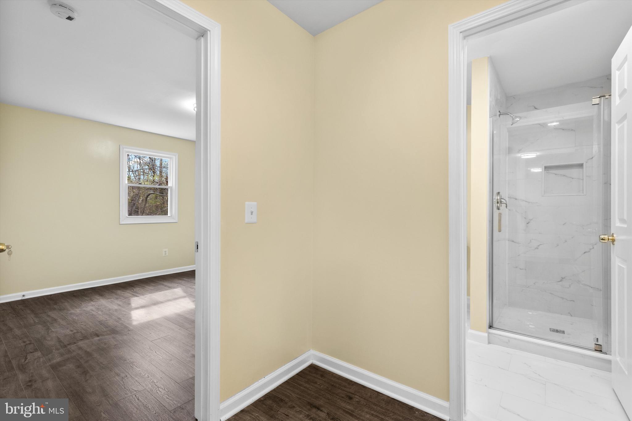 5662 Gunpowder Road White Marsh, MD 21162 - Photo 27 of 37 a view of an empty room with closet and wooden floor