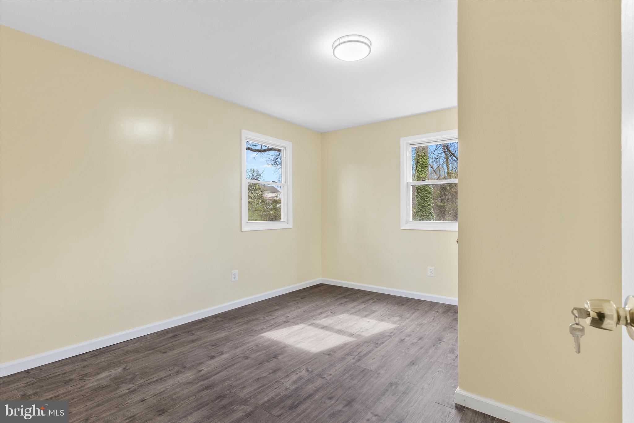 5662 Gunpowder Road White Marsh, MD 21162 - Photo 31 of 37 an empty room with a workspace and a window